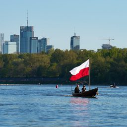 A Polish flag on the Vistula with Warsaw behind it, photographed on Flag Day, 2 May 2026